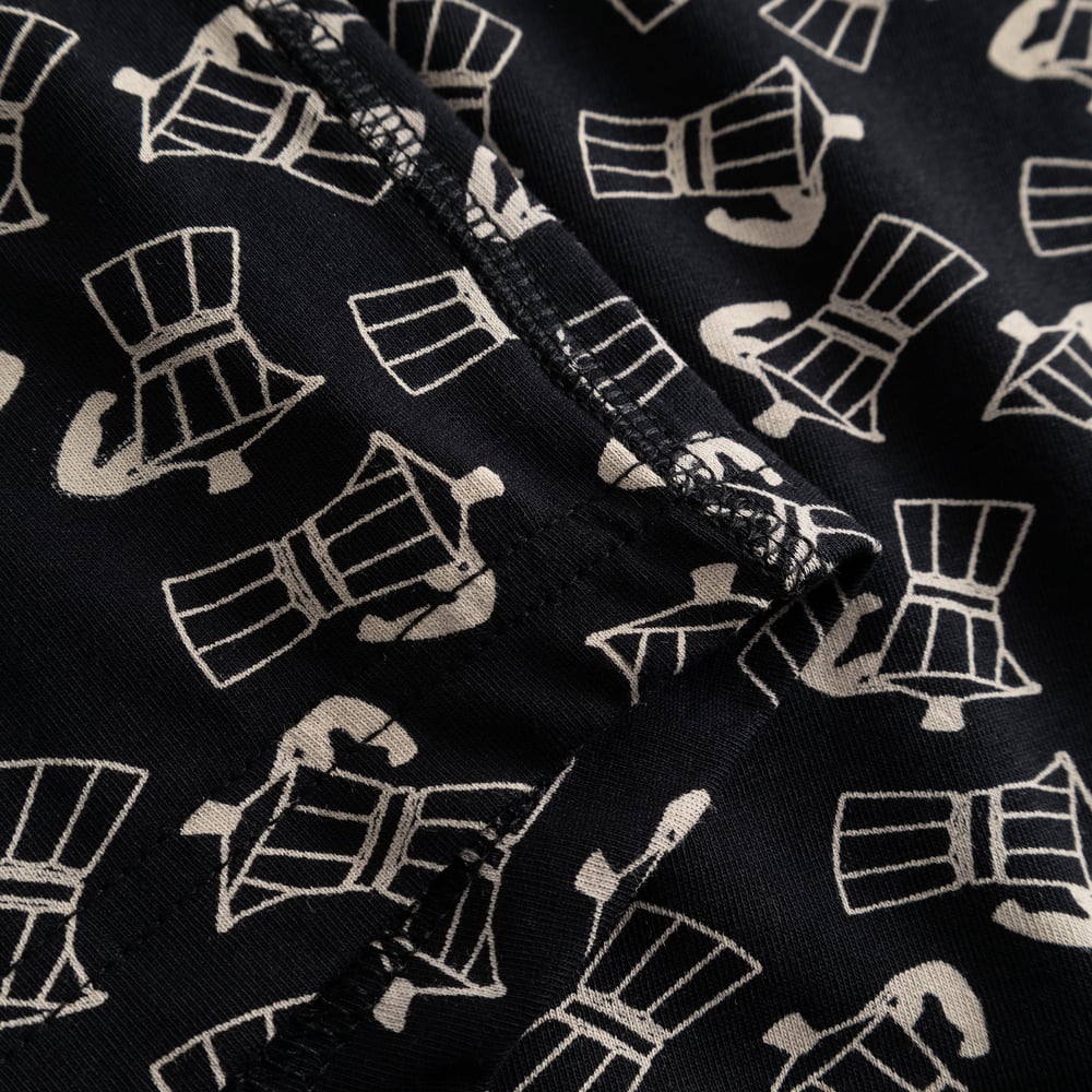 A close-up of the Kalix Mocca Black boxer briefs, highlighting the playful Moka pot pattern and the neat stitching.