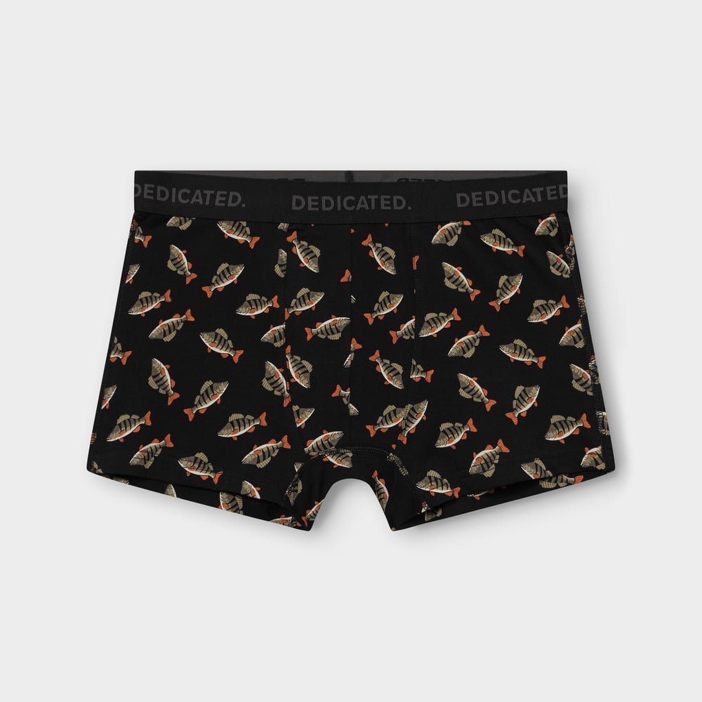 A pair of black boxer briefs with an all-over perch fish print and a grey logo waistband, against a light grey background.