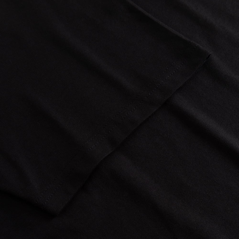 A close-up showing the soft organic cotton and neat stitching on the sleeve of the Stockholm t-shirt.