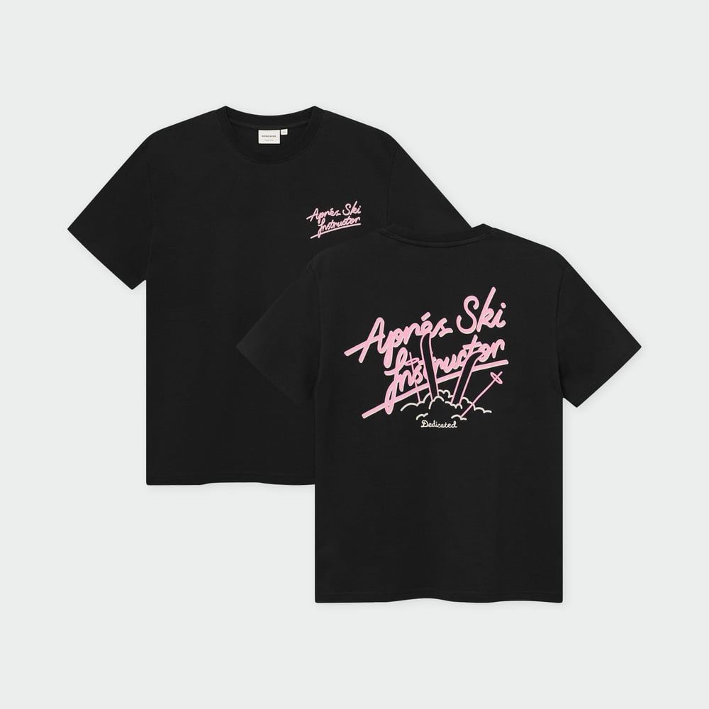 The Après Ski Instructor t-shirt in black, showing off its cool pink graphic on both the front and back.