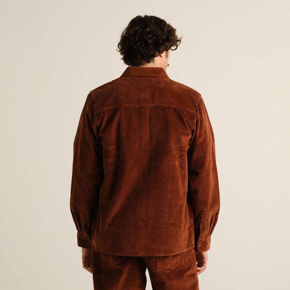 A look at the back of the Shirt Kil Corduroy in Cappuccino Brown, highlighting the relaxed fit and soft, thick fabric.