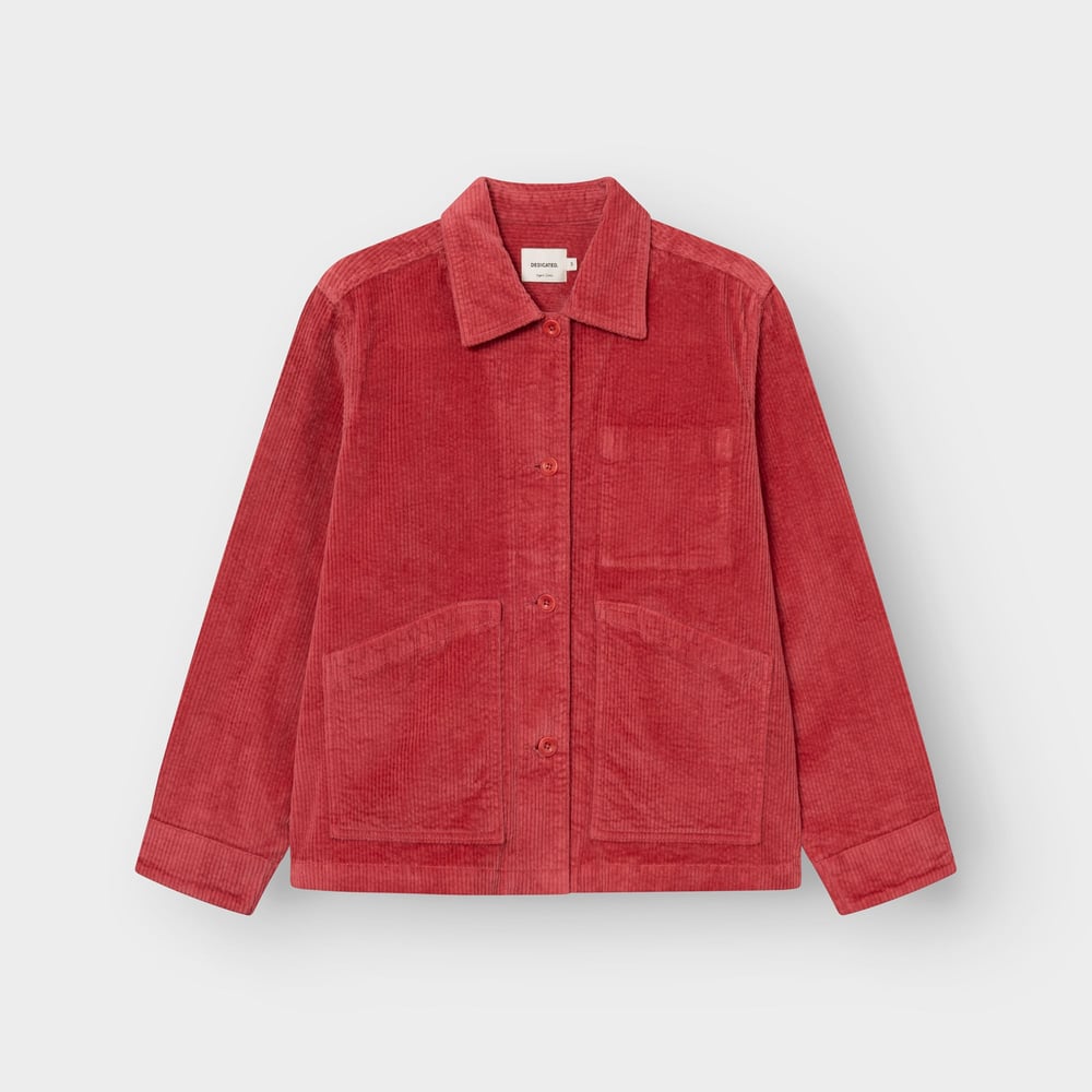 Front view of the Dedicated Stiby Corduroy Jacket in Holly Red, laid flat on a light grey background.