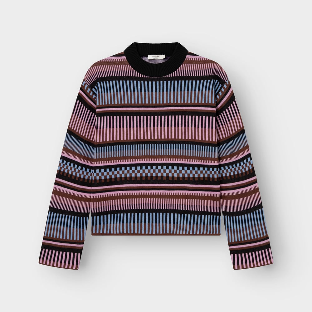 A flat lay image of the Sweater Limhamn, featuring a vibrant dashed stripe pattern in pink, blue, brown and black.
