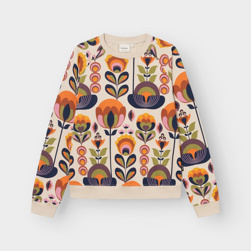 A fun and vibrant sweatshirt laid flat. It's the Ystad style, featuring a colorful retro Autumn Harvest floral print.