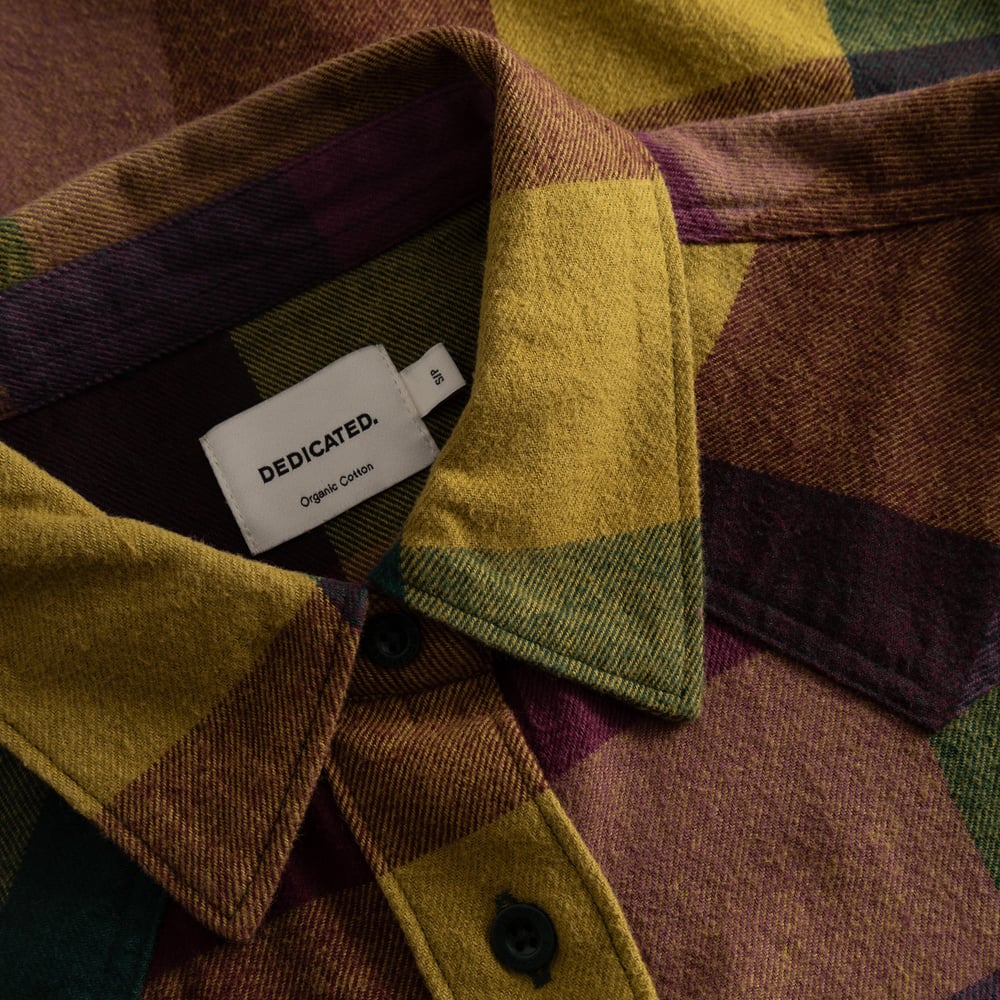 Get up close with the cozy details of our Shirt Arboga Flannel, featuring a bold multi-color plaid and soft organic cotton.