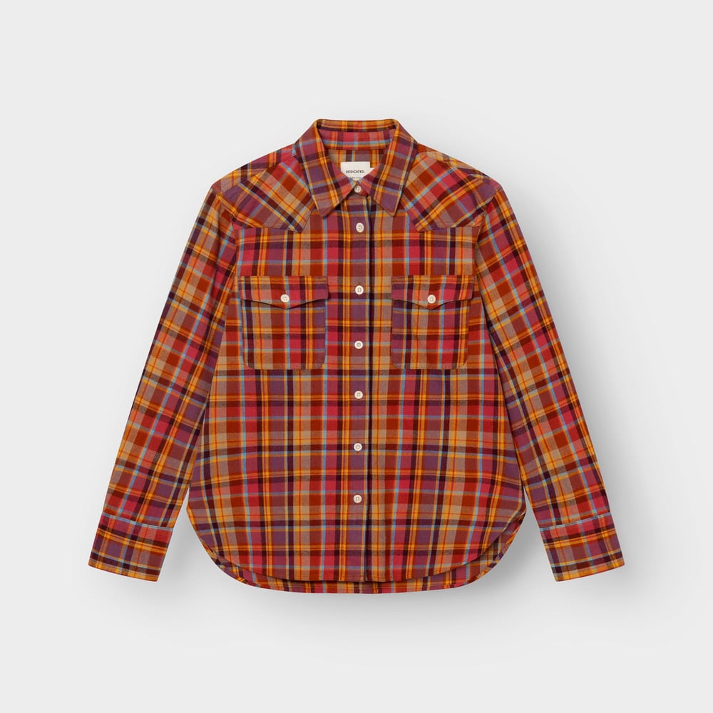 Flat lay of the Arboga Flannel Shirt in a multi-color Madras check, highlighting its western-style yokes and chest pockets.