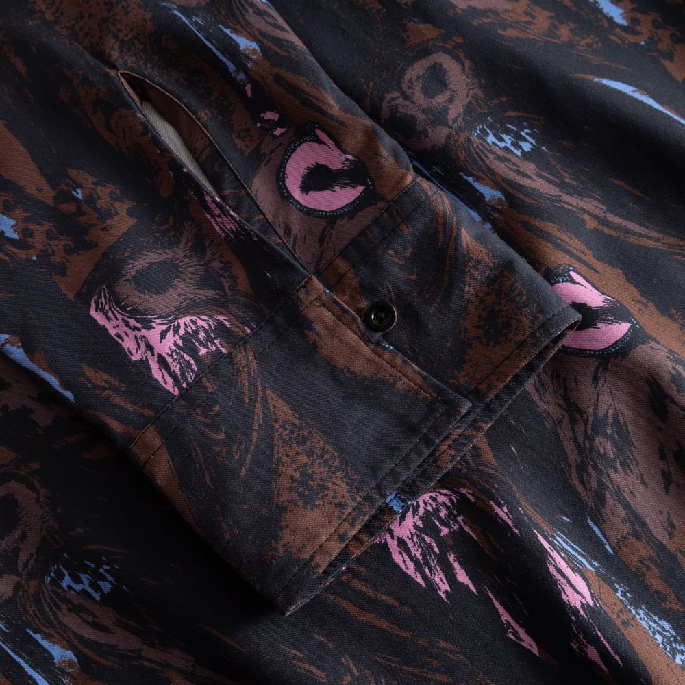 Close-up of the Kvilla Shirt Dress sleeve, showing the buttoned cuff and the detailed multi-color Owls print.