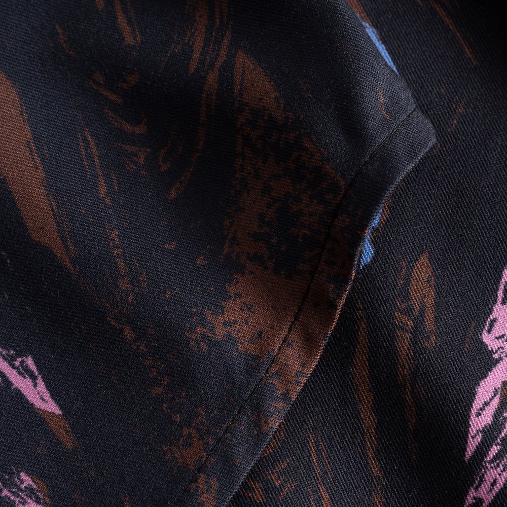 Close-up detail of the seam and heavy twill fabric of the Shirt Dress Kvilla with its colourful Owls print.