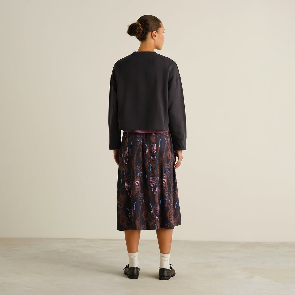 A back view of our Skirt Viken Owls Multi Color, showing off its beautiful flow and fun pattern.