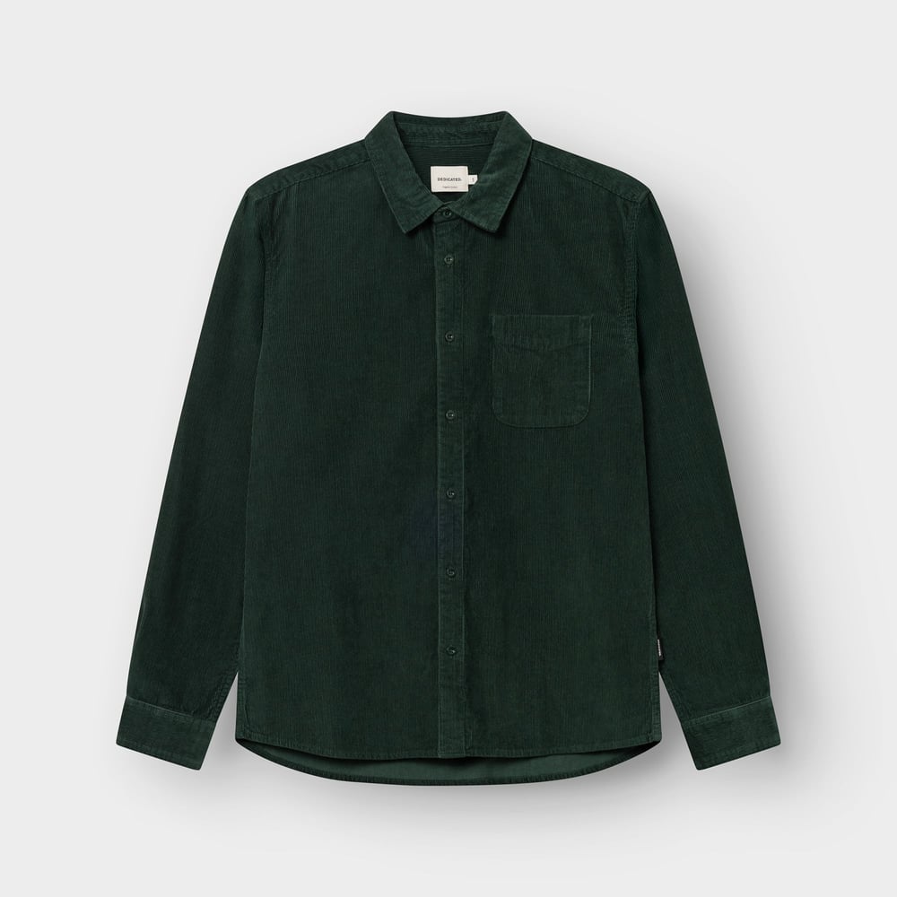 Studio photo of the Shirt Varberg Corduroy in Dark Green, laid flat.