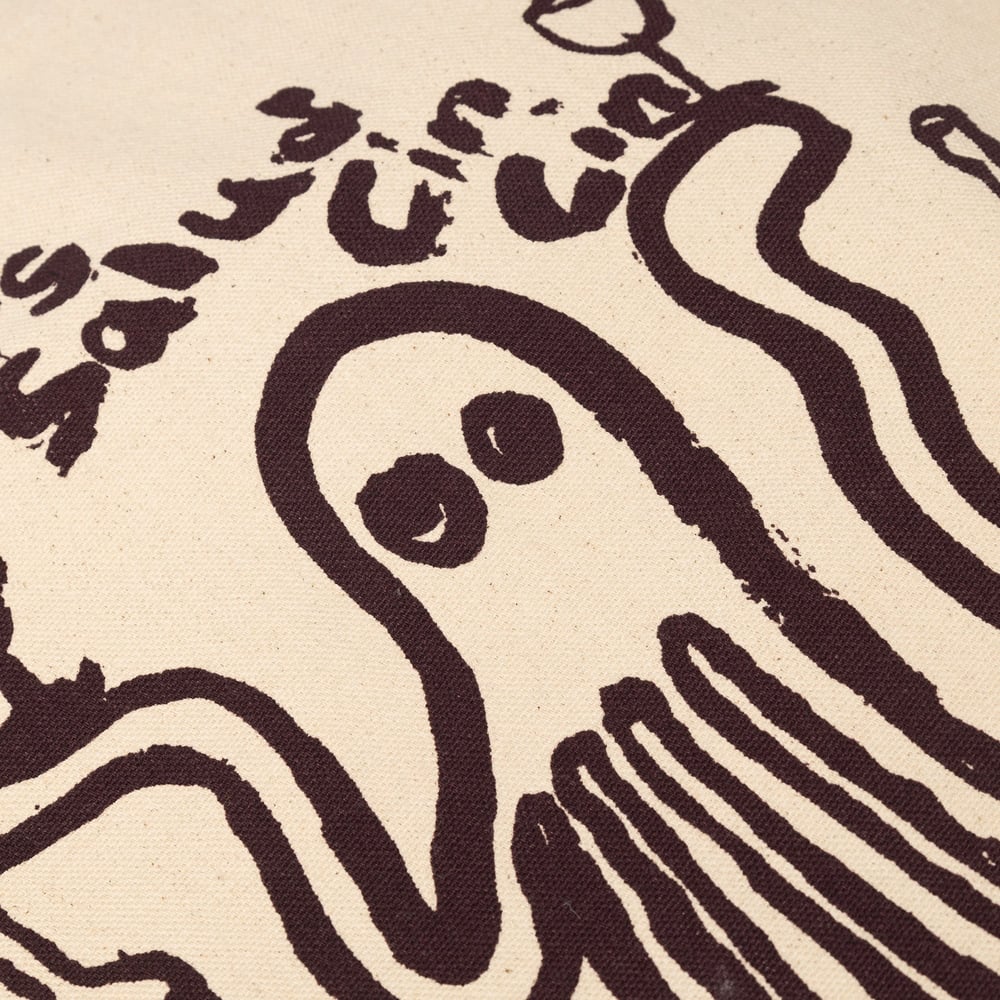 A detailed close-up of our Tote Bag Torekov, showing the fun ghost character from the 'Cheers Salud' print on organic canvas.