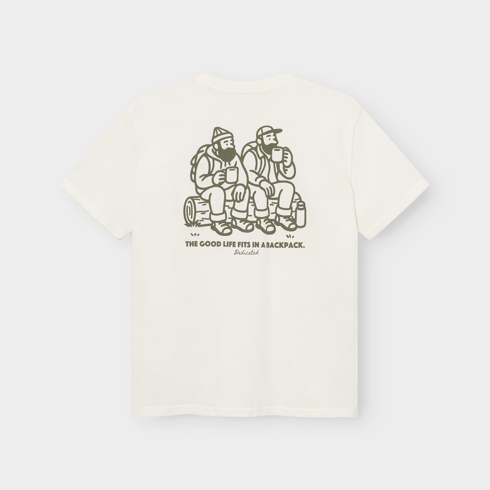 Back of the off-white Stockholm tee, with a print of two hikers on a log and the text 'The good life fits in a backpack'.