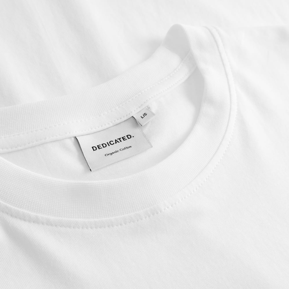 A close-up shot showing the fine details of the collar and brand label on the T-shirt Stockholm Race Bike EMB.