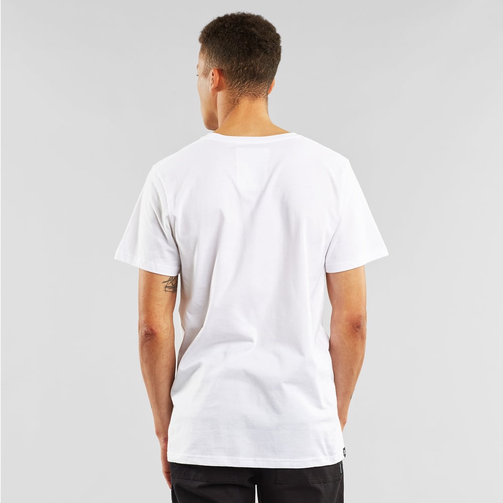 Back view of a model wearing the white T-shirt Stockholm Astrid och Duvan.