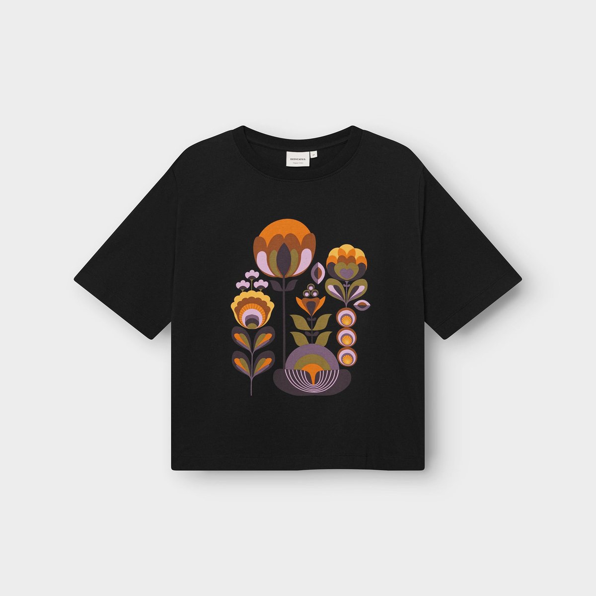 The Vadstena T-shirt in black, laid flat to showcase its colorful Autumn Harvest graphic with a cool, retro vibe.