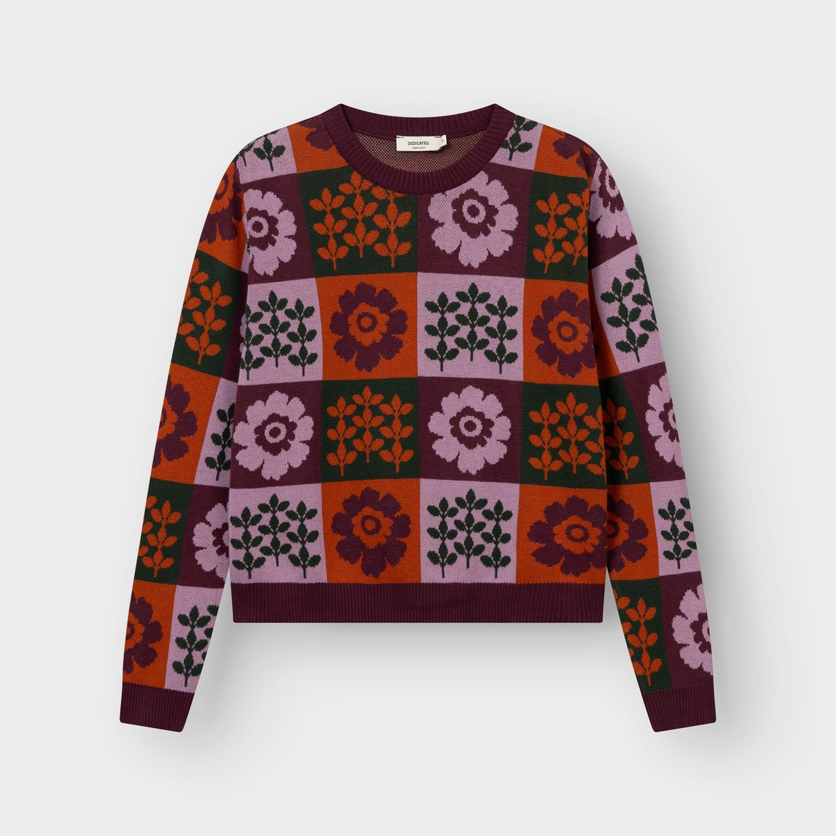 Front view of the Sweater Arendal Nature Check, a jacquard knit with a colorful checkerboard pattern of flowers and leaves.