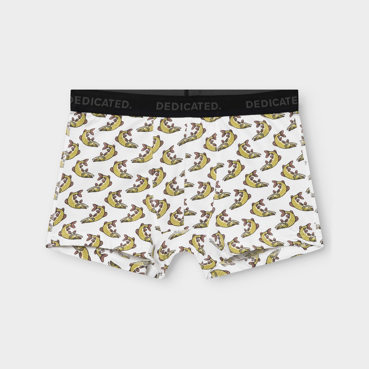 Flat lay shot of Dedicated's white Kalix boxer briefs, featuring a playful all-over print of yellow pike fish.