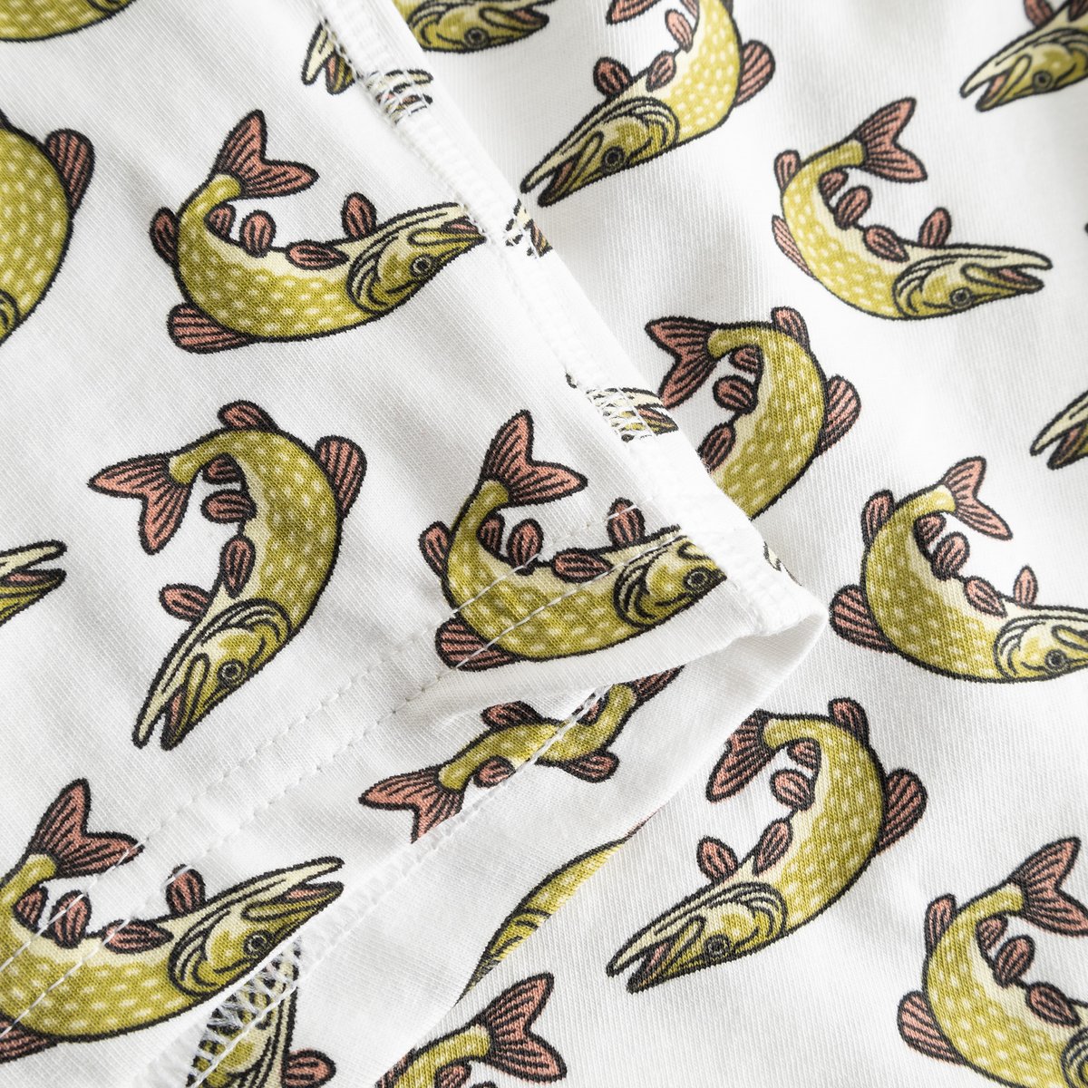 Close-up of the fun pike fish print on the soft, white organic cotton fabric of the Kalix Boxer Briefs.