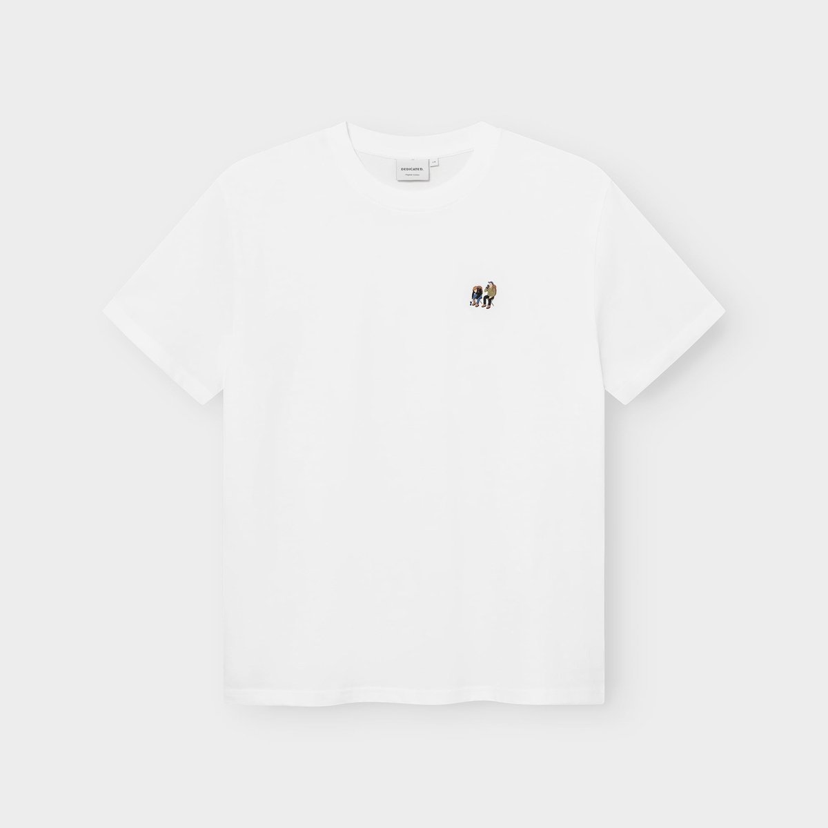 A white t-shirt, the Stockholm Camp Crew, laid flat against a grey background, showing the small embroidery on the chest.