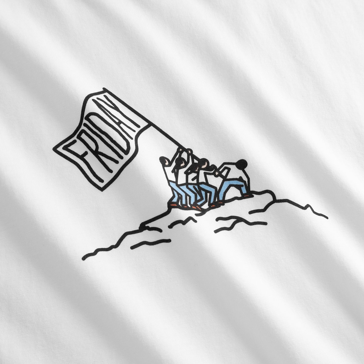 Close-up of the 'Friday Celebration' graphic on a white t-shirt, showing a team triumphantly raising a flag for the weekend.
