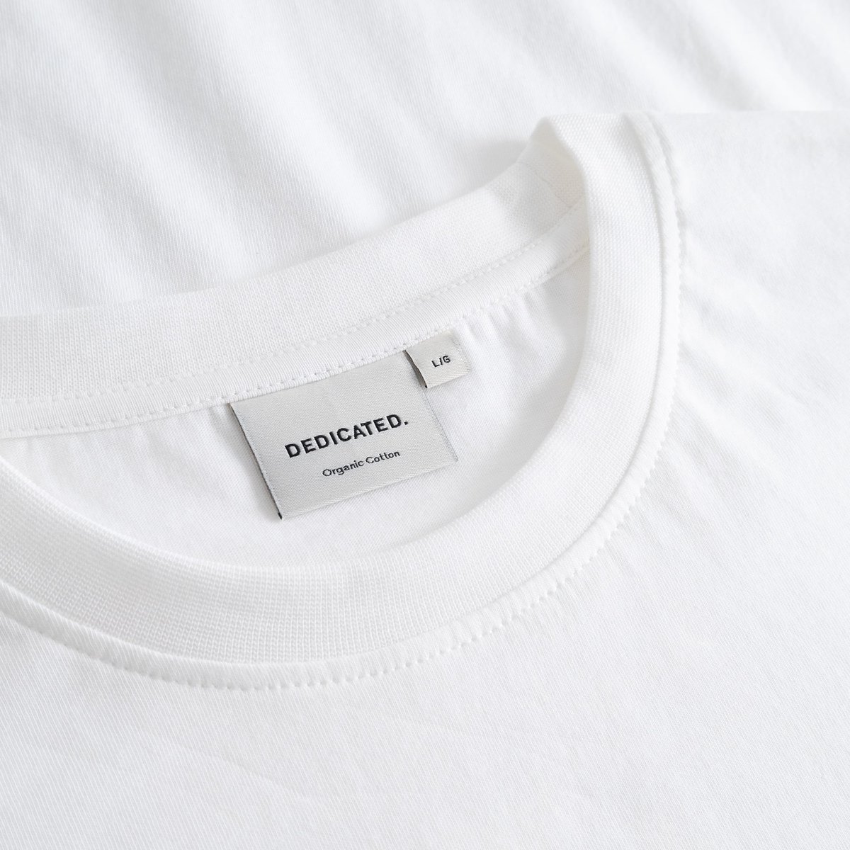 A close look at the comfy ribbed collar and classic Dedicated label on our Stockholm T-shirt.