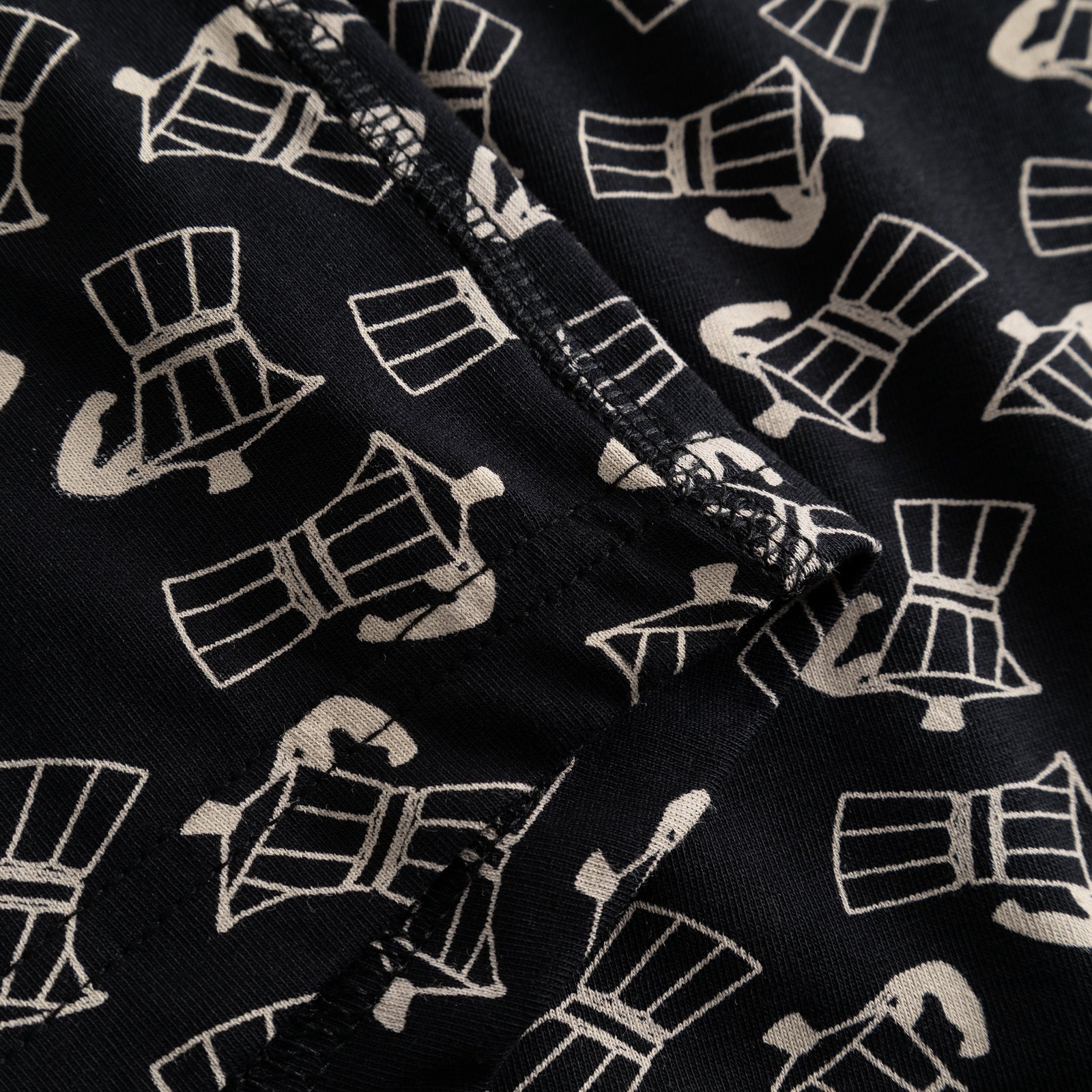 A close-up of the Kalix Mocca Black boxer briefs, highlighting the playful Moka pot pattern and the neat stitching.