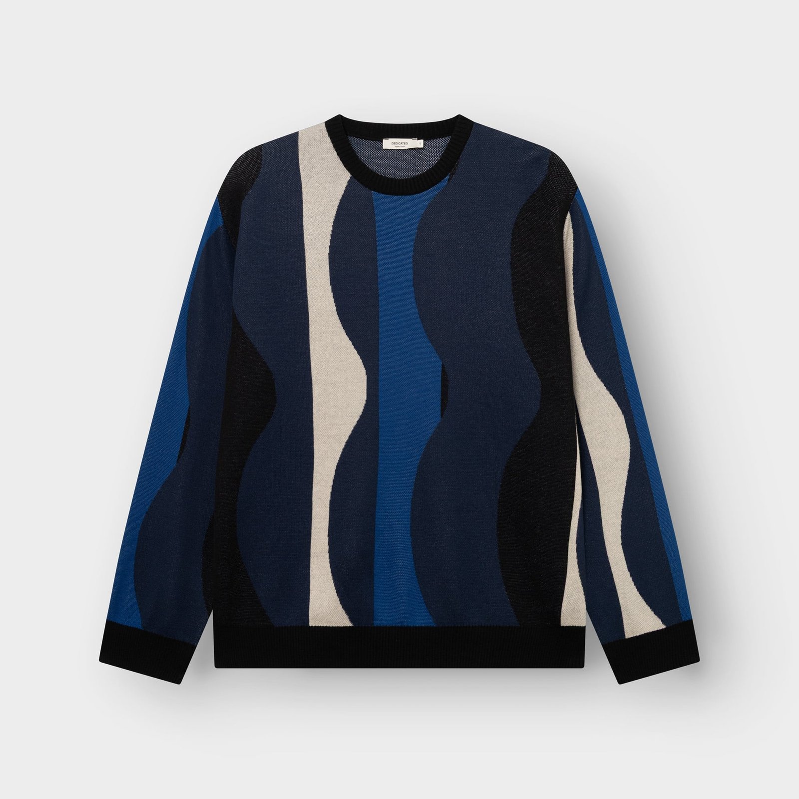 Front view of the Sweater Mora with its eye-catching wavy stripe pattern in shades of blue, black, and cream.