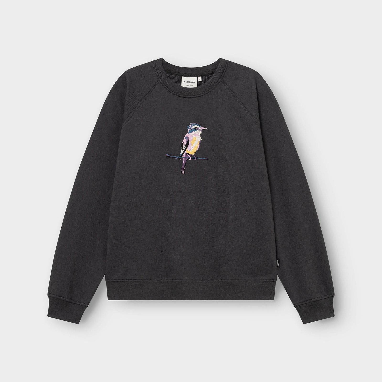 Flat lay of the charcoal Ystad sweatshirt, featuring a colorful and detailed embroidery of a painted bird on the chest.
