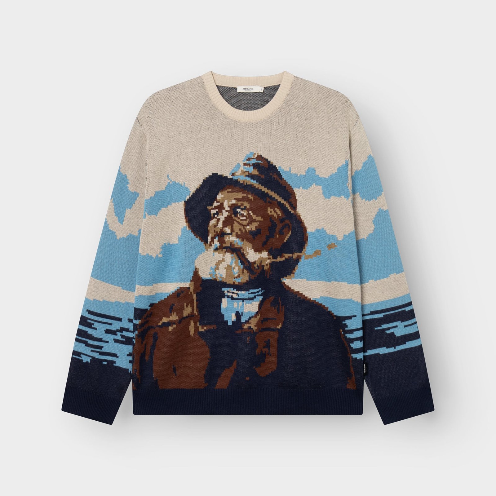 The Sweater Mora Man and Sea in multi-color, laid flat to showcase its jacquard-knit graphic of a classic fisherman.