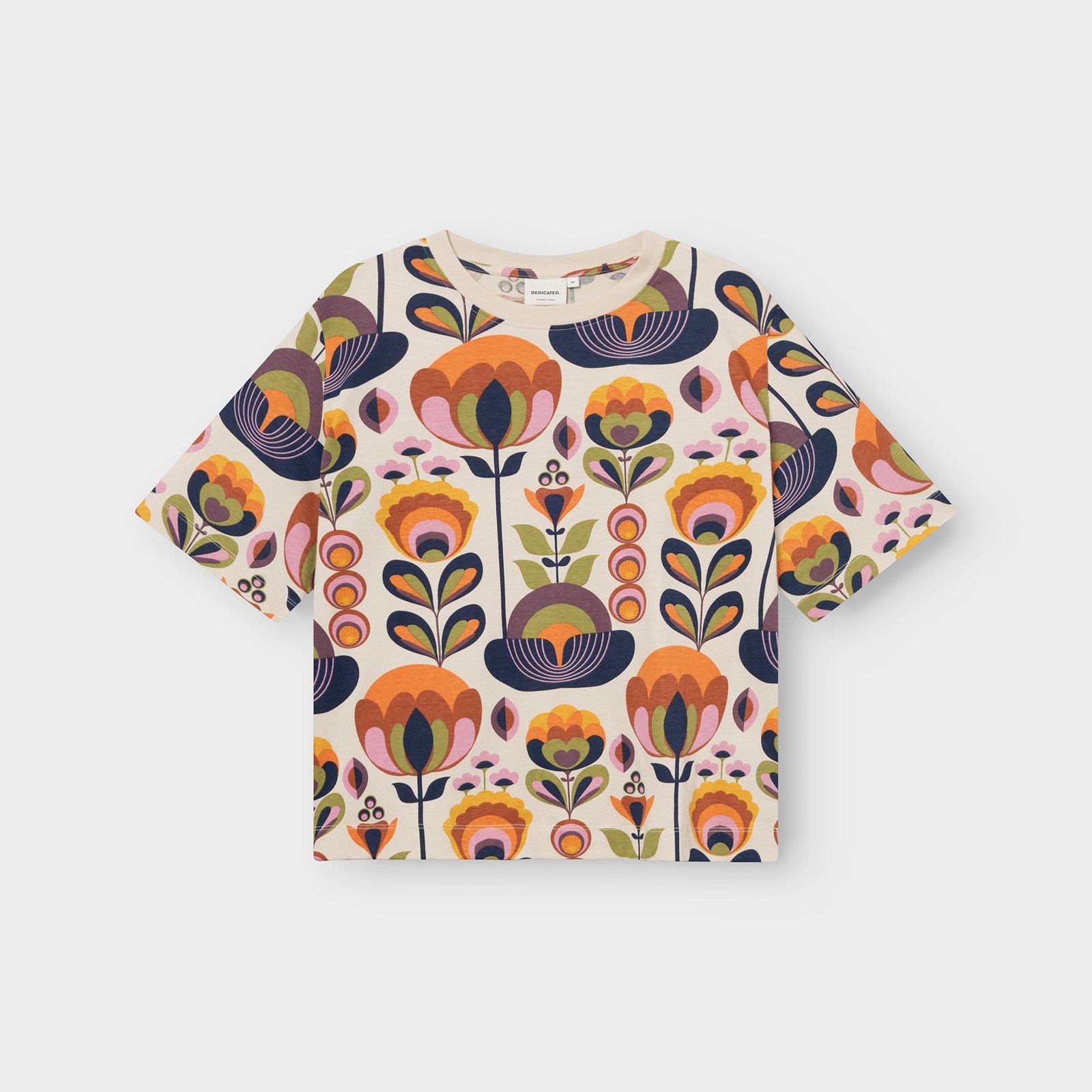 A flat lay of the Vadstena T-shirt, covered in a vibrant and fun retro floral 'Autumn Harvest' print.