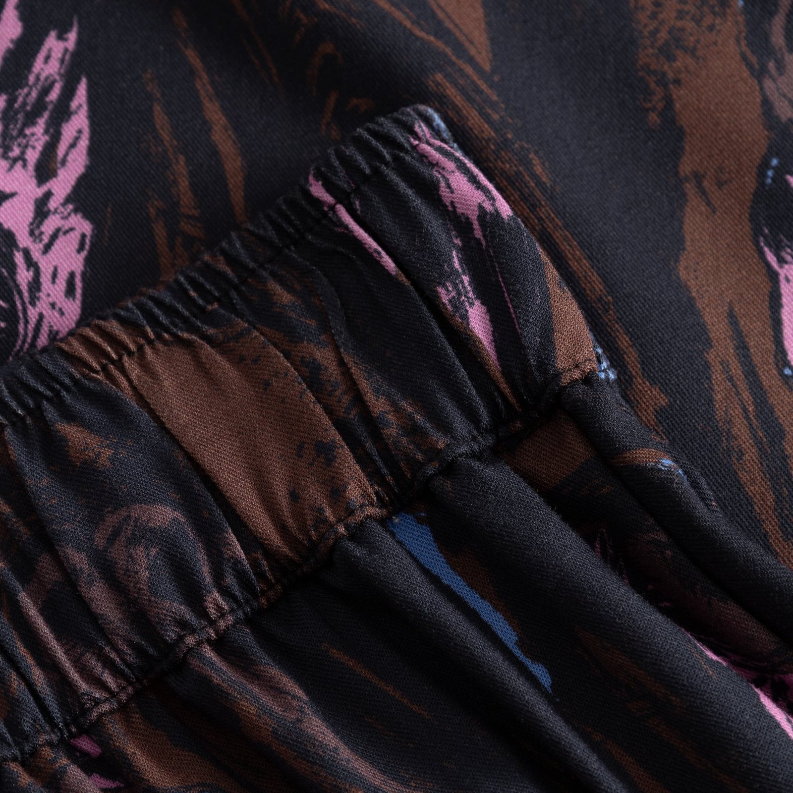 A close-up of the Skirt Viken, showing the detailed owl print and the comfortable, gathered elastic waistband.