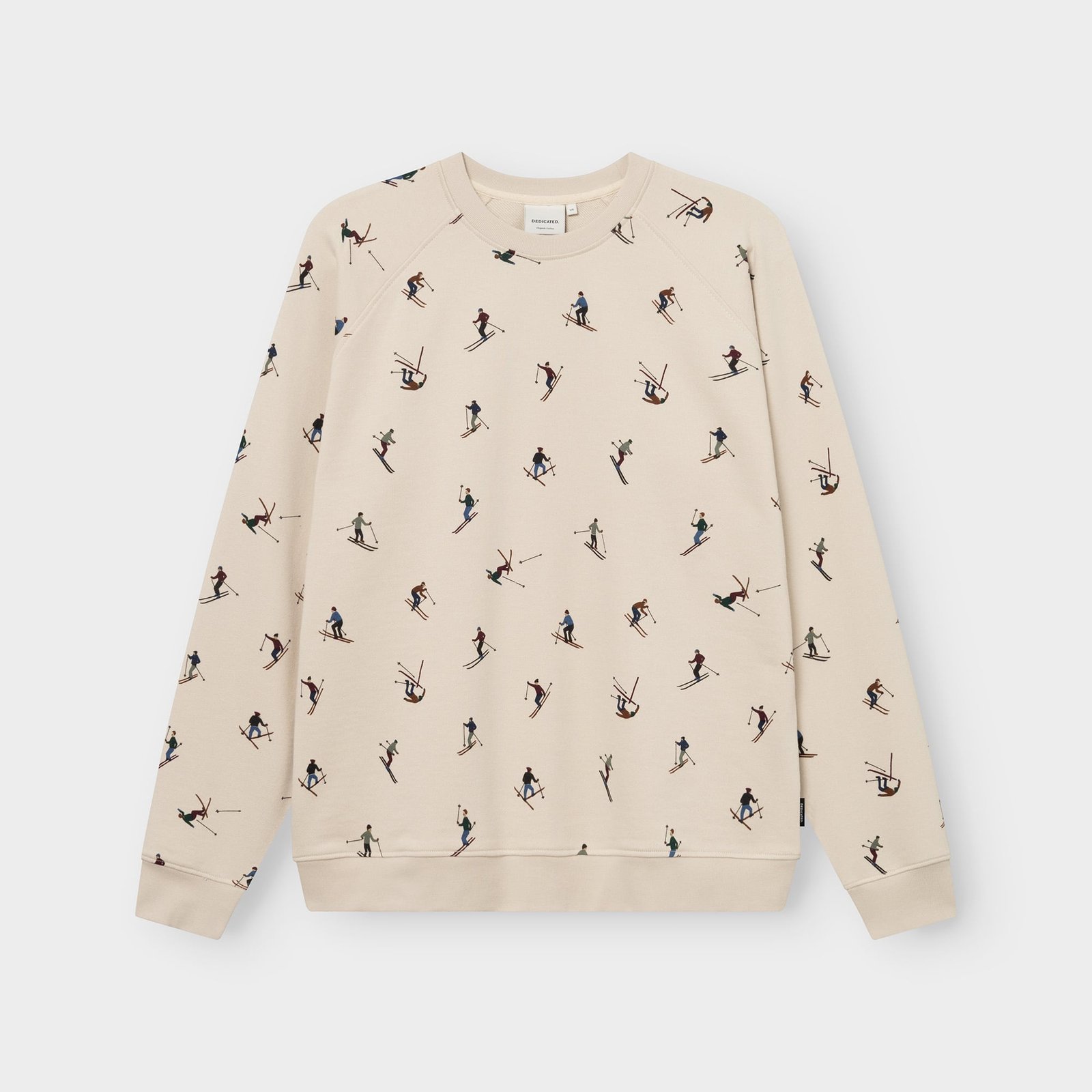 Studio shot of the oat white Sweatshirt Malmoe Ski Team, featuring a fun all-over print of tiny, colorful skiers.