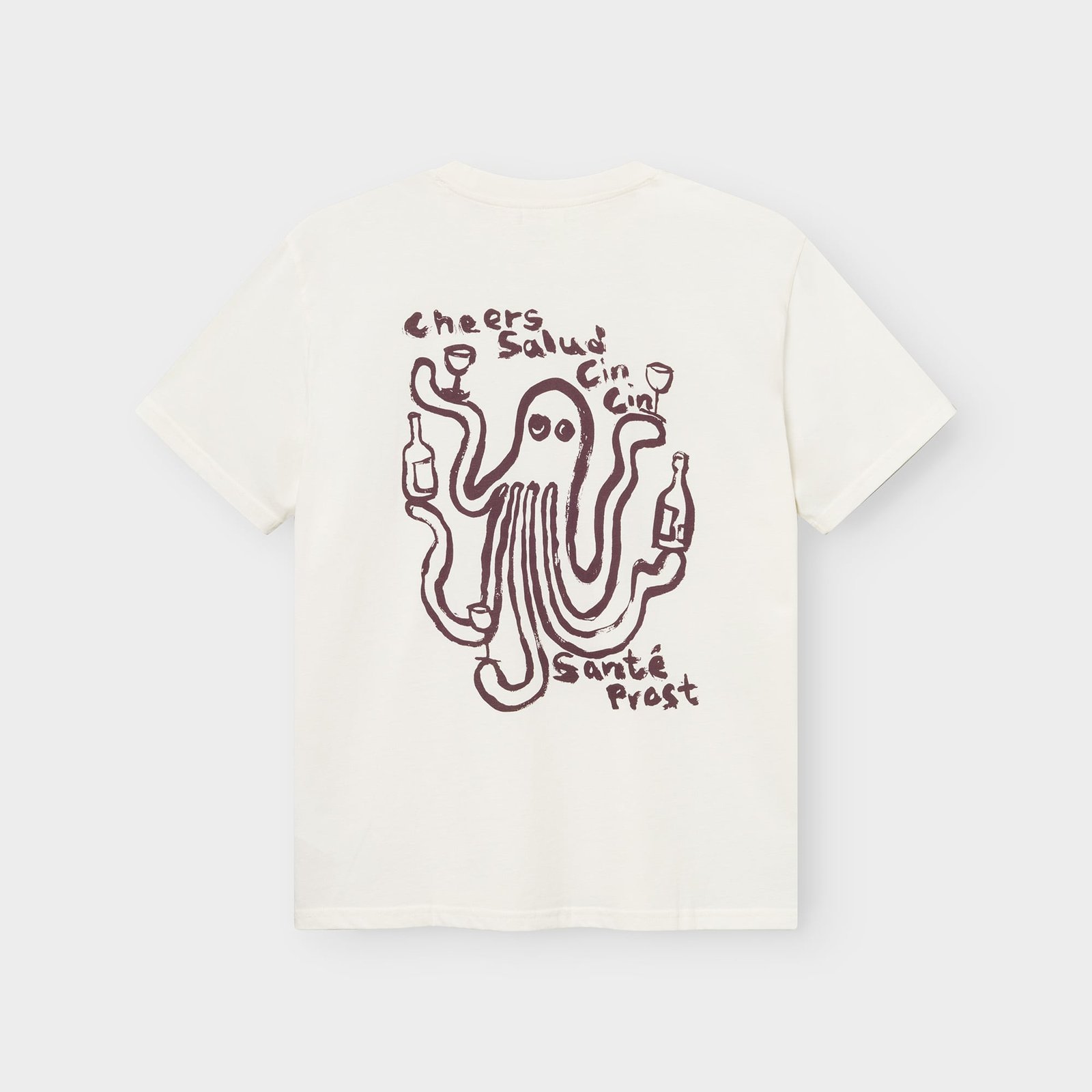 Rückansicht eines cremeweißen T-Shirts mit Oktopus-Print, der Weingläser hält, und „Cheers“ in mehreren Sprachen.