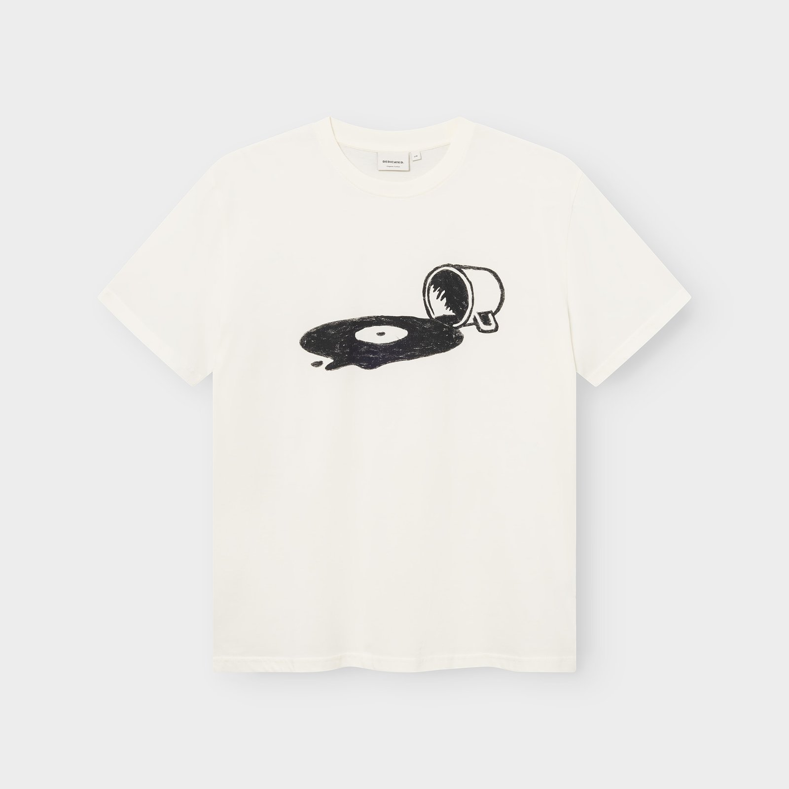 A flat lay of the T-shirt Stockholm Spilled in off-white, with its unique graphic of a cup spilling out a vinyl record.