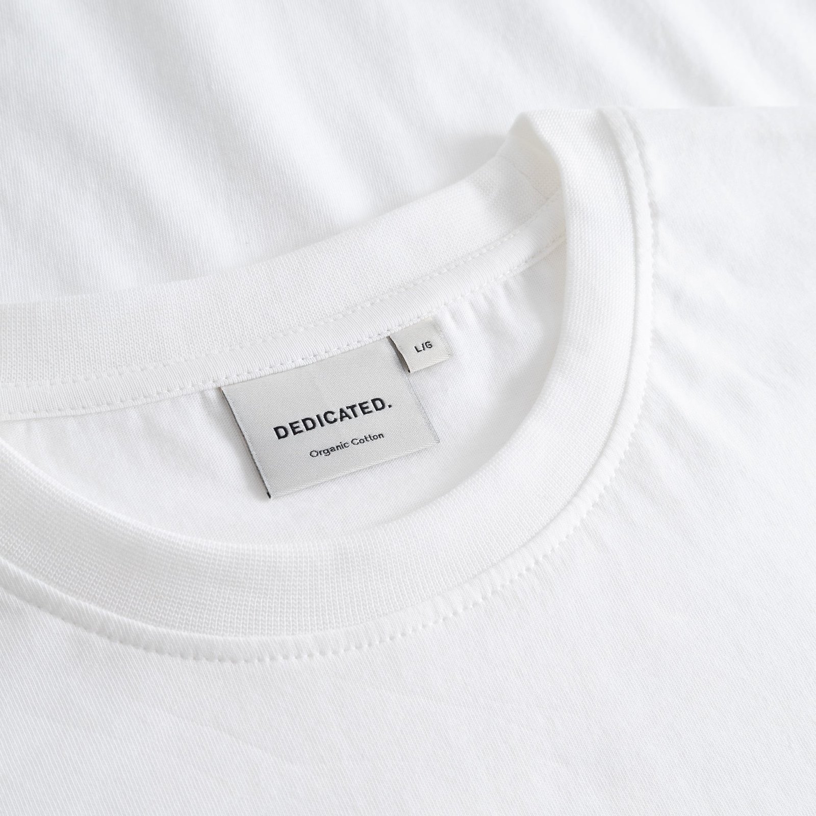 A close look at the comfy ribbed collar and classic Dedicated label on our Stockholm T-shirt.