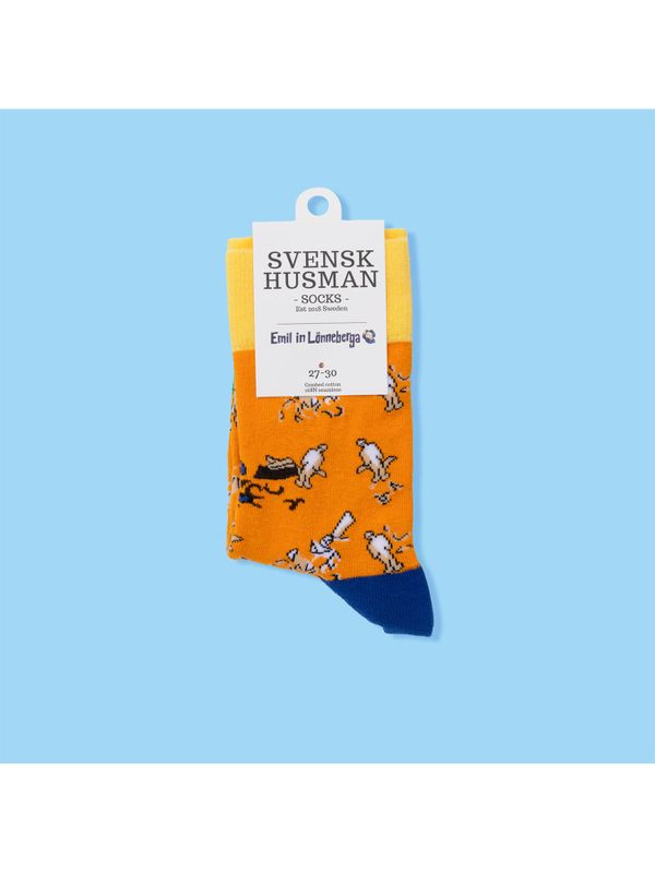 Socks Emil in Lönneberga carving his wooden figures - Adult