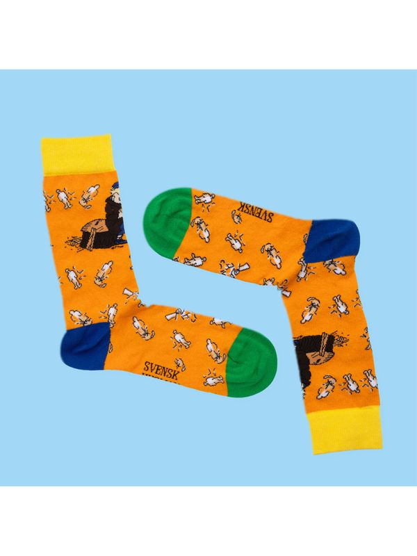 Socks Emil in Lönneberga carving his wooden figures - Adult